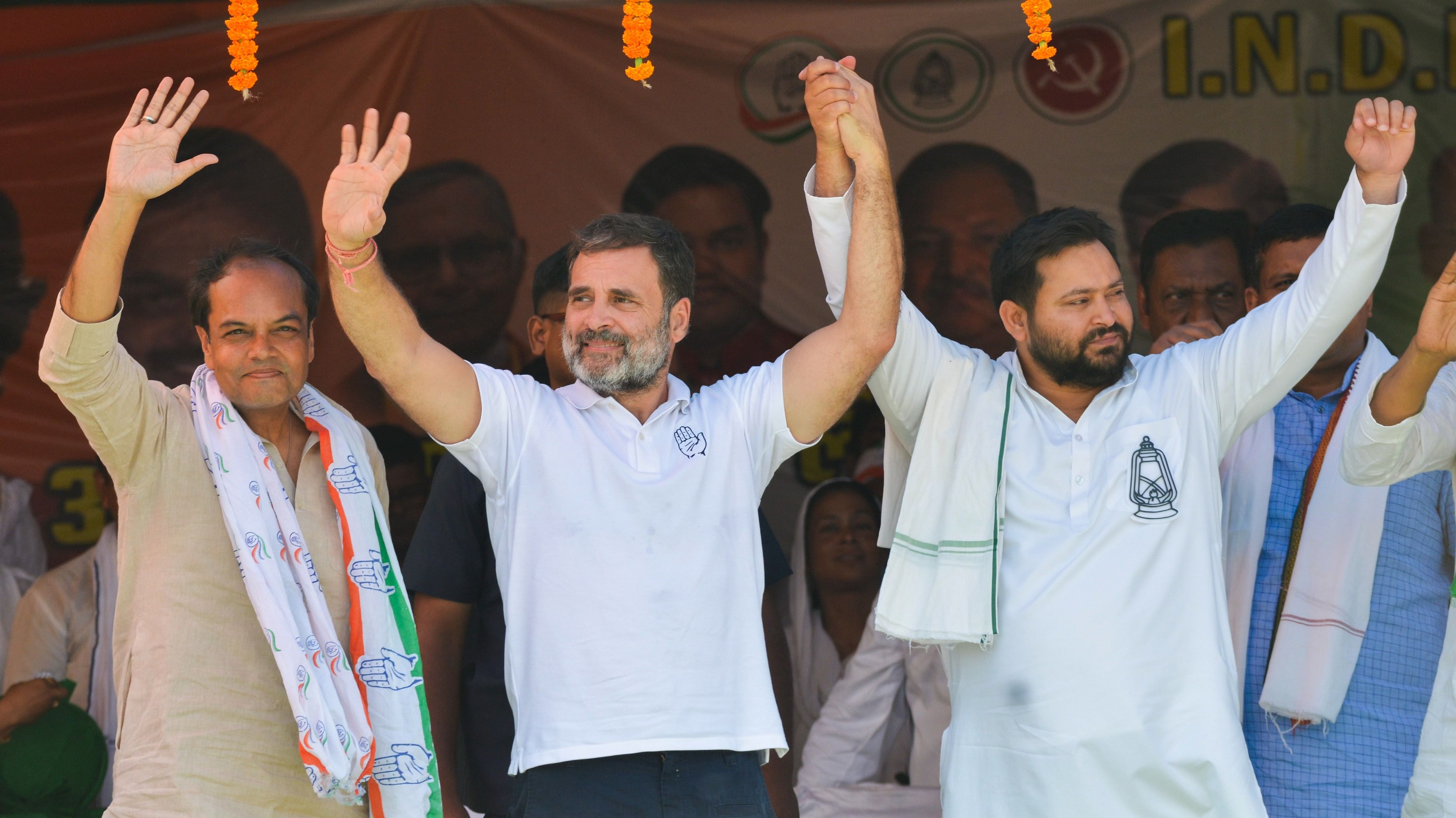 <div class="paragraphs"><p>Congress leader Rahul Gandhi, RJD leader Tejashwi Yadav and INDIA alliance (Congress) candidate Anshul Avijit during a public meeting for Lok Sabha polls, at Khusrupur, in Patna, on Monday.</p></div>