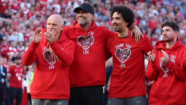 <div class="paragraphs"><p>Liverpool manager Juergen Klopp and coaching staff applaud fans after his last match as Liverpool manager.</p></div>