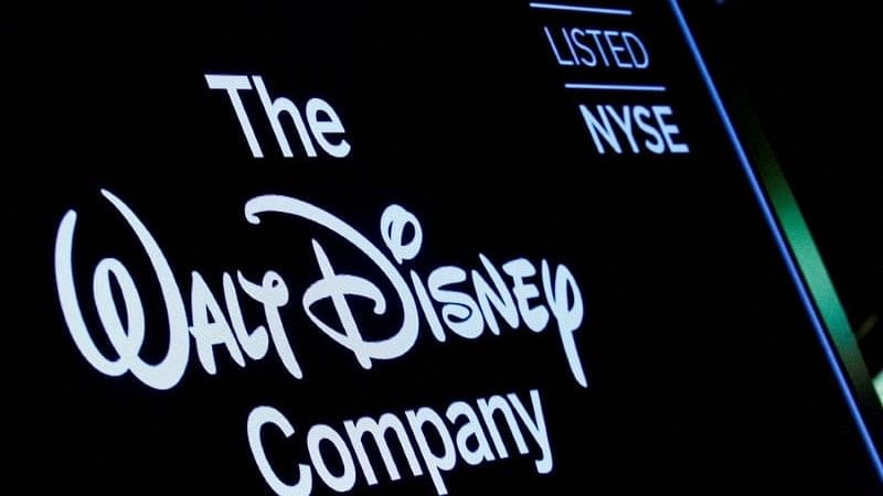 <div class="paragraphs"><p>A screen shows the logo and a ticker symbol for The Walt Disney,</p></div>