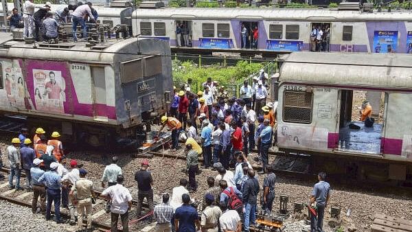 <div class="paragraphs"><p>Restoration work underway after a local train derailed on the Harbour line, in Mumbai, Monday, April 29</p></div>