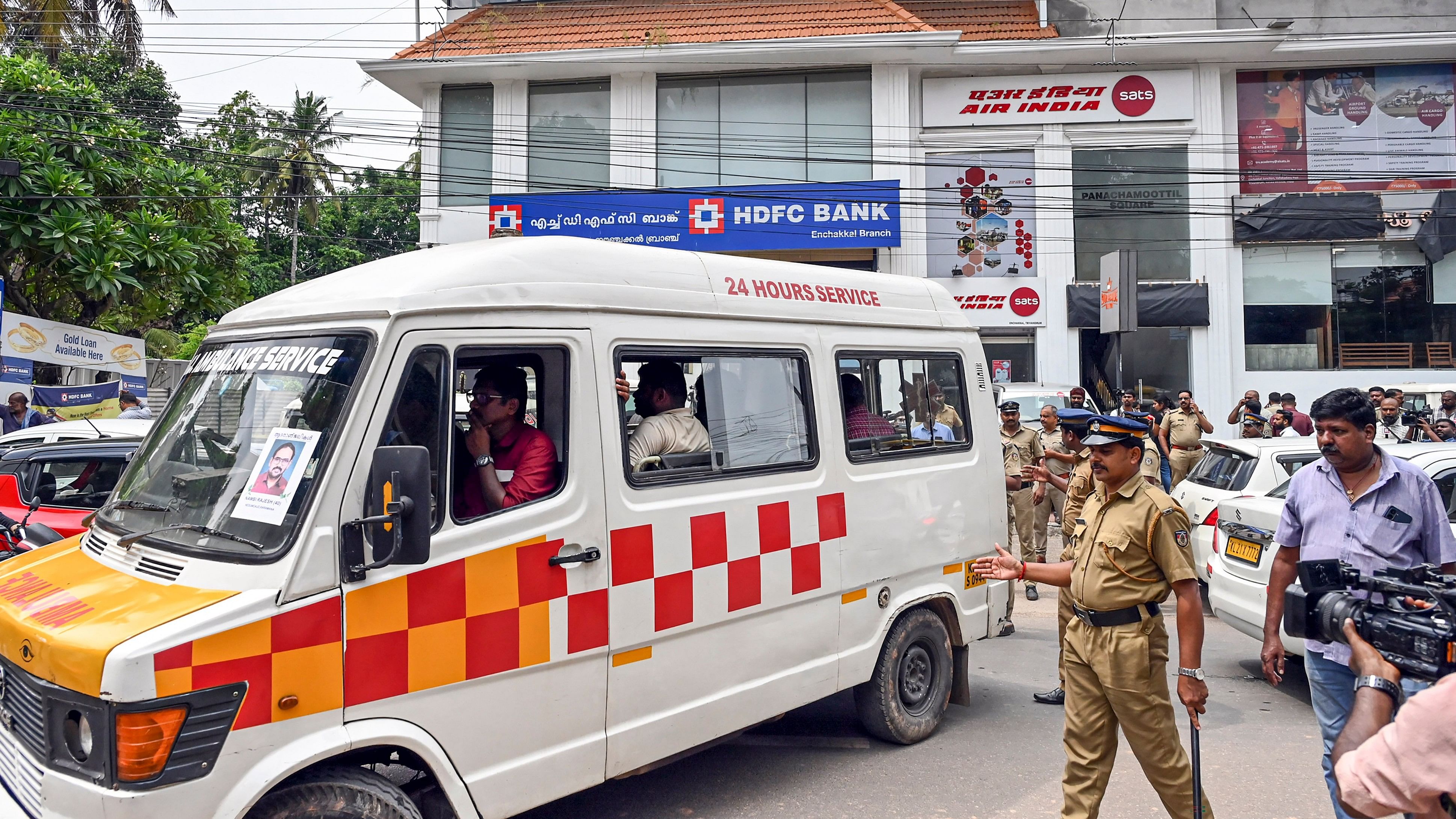 <div class="paragraphs"><p>An ambulance carries the mortal remains of Nambi Rajesh, an engineer who died in Oman, at Air India Sats office, in Thiruvananthapuram, Thursday, May 16, 2024. </p></div>