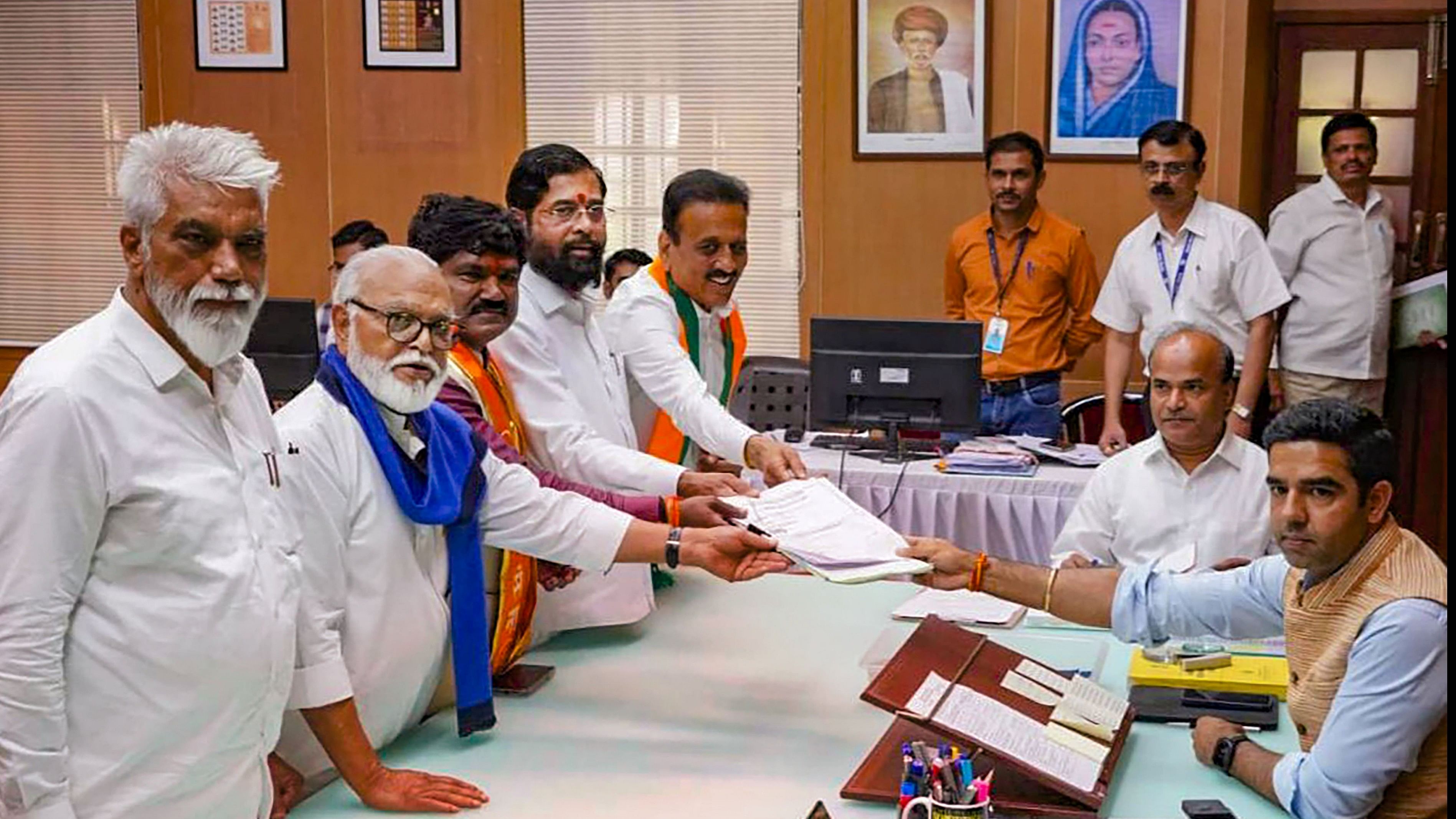 <div class="paragraphs"><p>Shiv Sena (Shinde faction) candidate Hemant Godse files his nomination papers for Lok Sabha polls in the presence of Maharashtra CM Eknath Shinde and Ministers Chhagan Bhujbal, Girish Mahajan and Dada Bhuse, in Nashik, Thursday, May 2, 2024. </p></div>