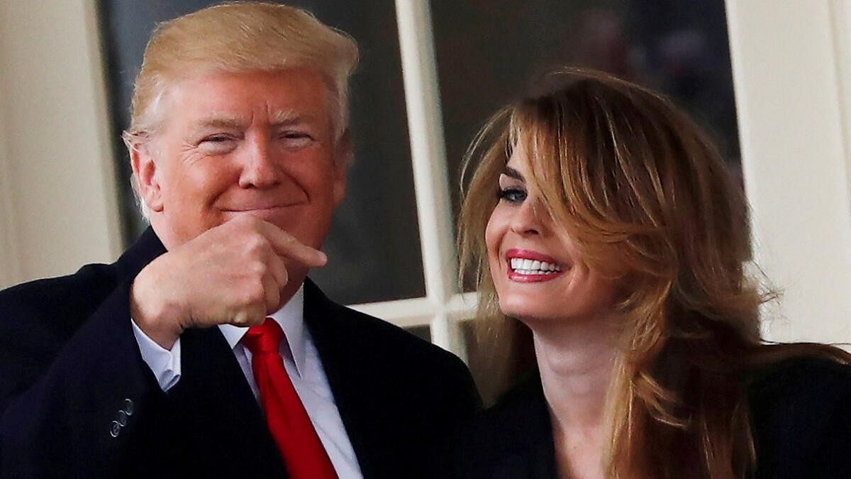 <div class="paragraphs"><p>Former US president Donald Trump (left) along with former press secretary and White House Communications Director Hope Hicks.</p></div>