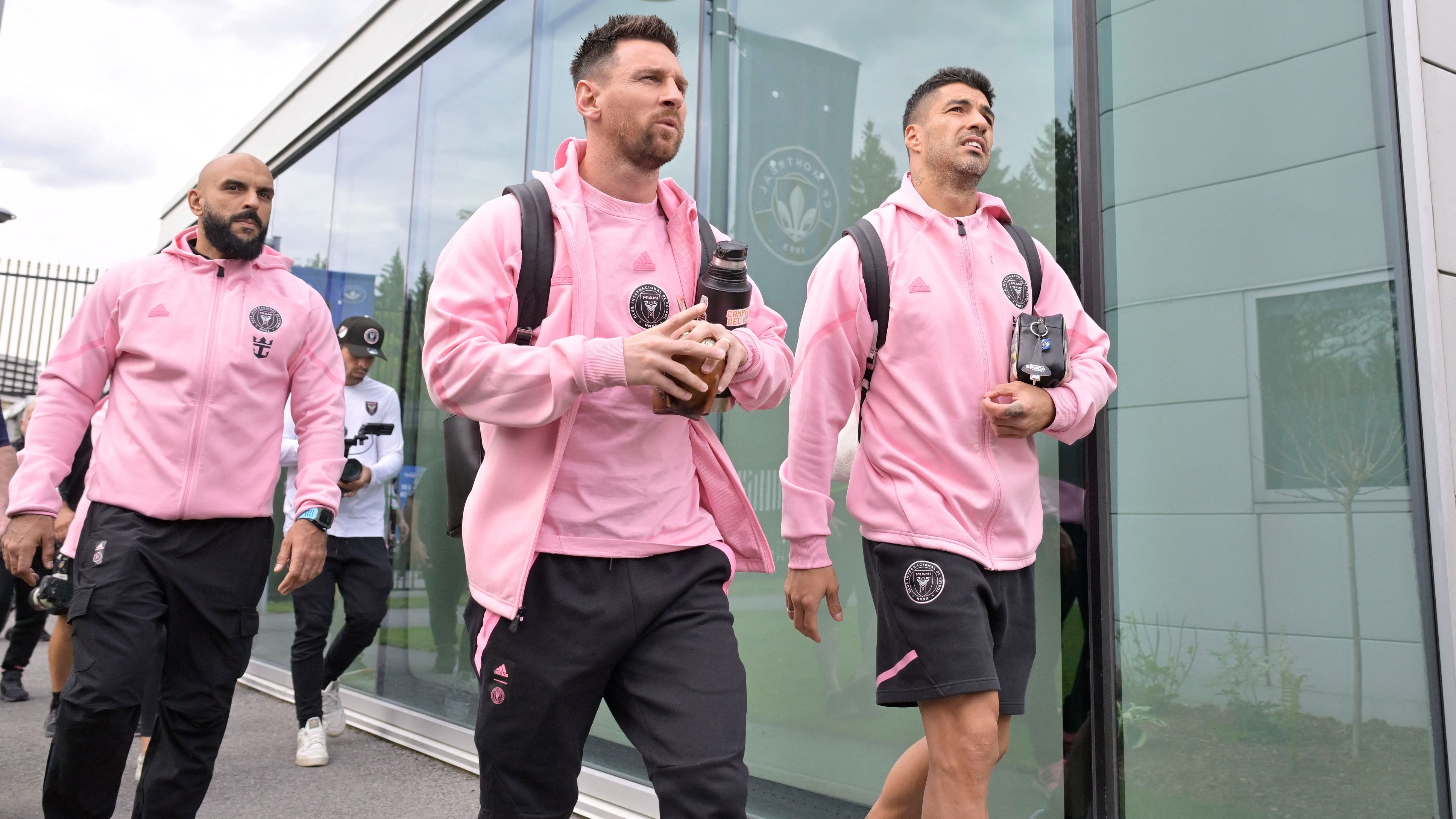 <div class="paragraphs"><p>Inter Miami CF forward Lionel Messi (10) and forward Luis Suarez (9) arrive before the game against CF Montreal at Stade Saputo.</p></div>