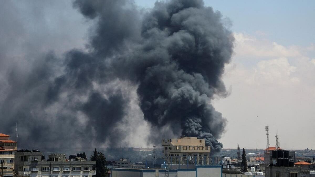 <div class="paragraphs"><p>Smoke rises after an Israeli strike as Israeli forces launch a ground and air operation in the eastern part of Rafah, amid the ongoing conflict between Israel and Hamas, in Rafah, in the southern Gaza Strip.</p></div>