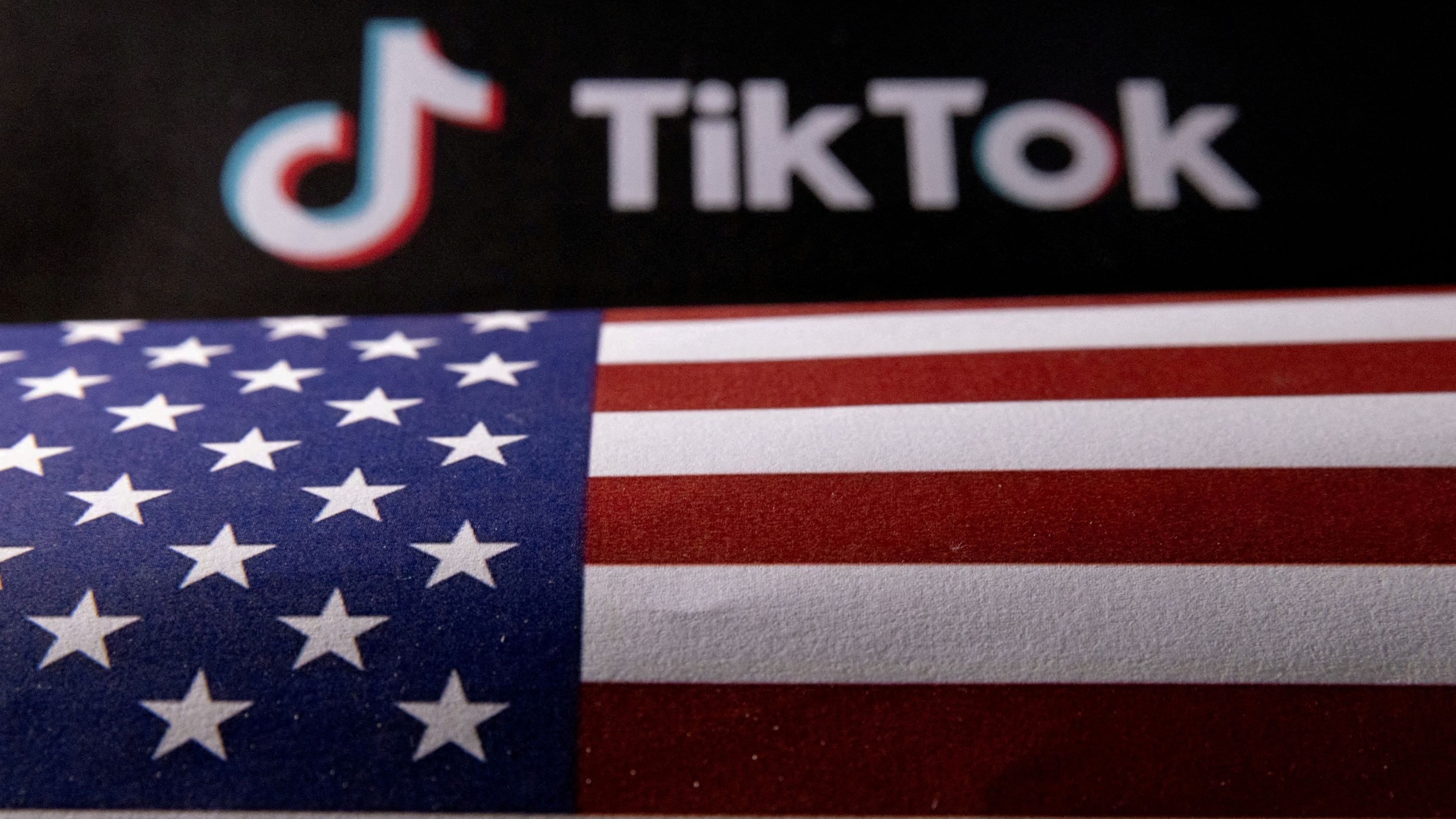 <div class="paragraphs"><p>Illustration shows US flag and TikTok logo</p></div>