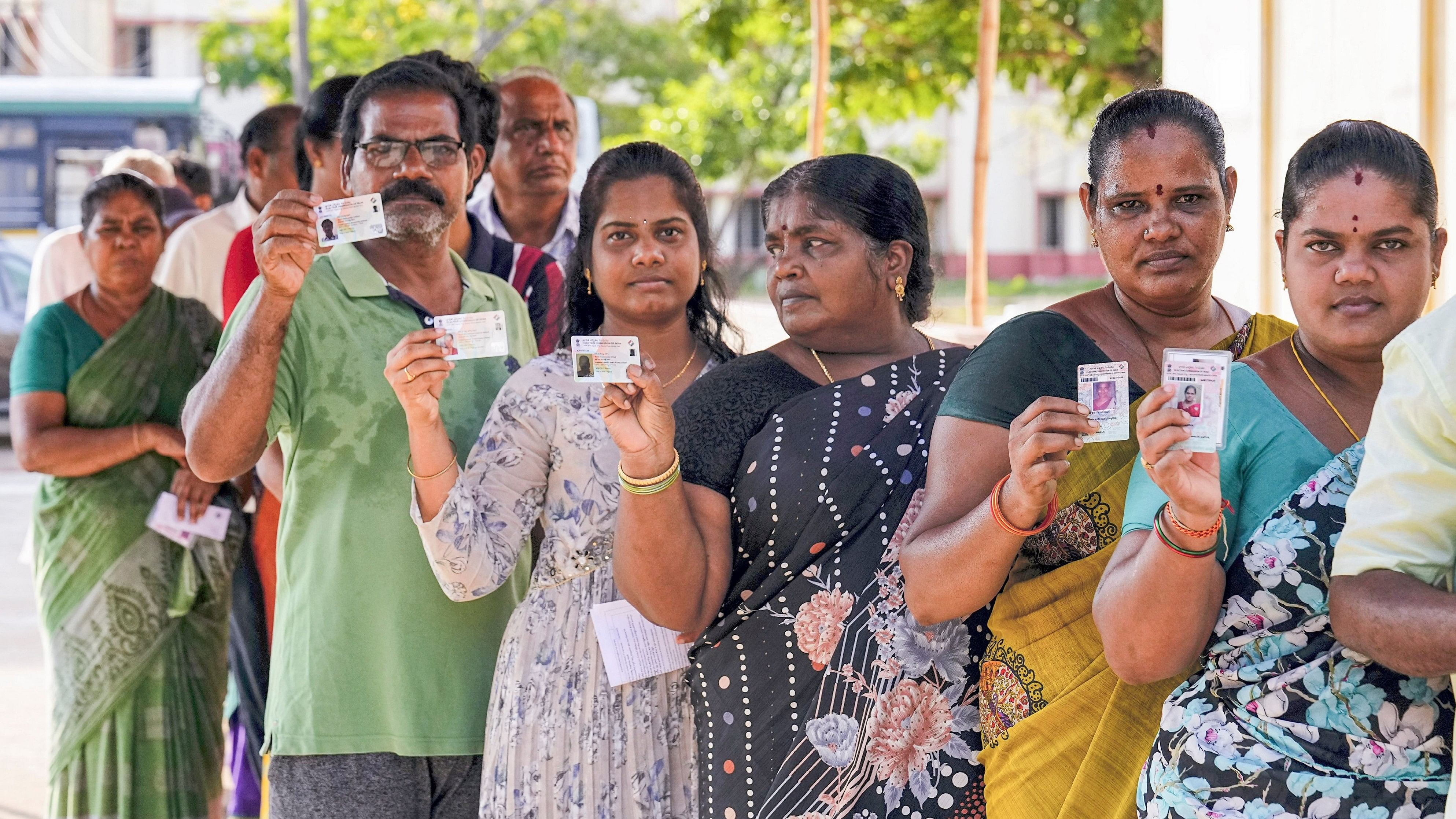 <div class="paragraphs"><p>Representative image of voters in line to cast their votes</p></div>