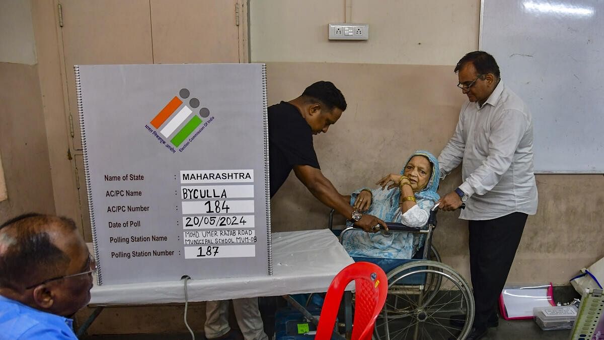 <div class="paragraphs"><p>An elderly voter being assisted to cast her vote for the fifth phase of Lok Sabha elections, in Mumbai.</p></div>