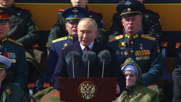 <div class="paragraphs"><p>Russian President Vladimir Putin delivers a speech during a military parade on Victory Day.</p></div>