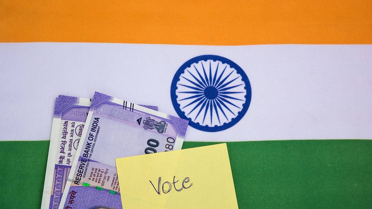 <div class="paragraphs"><p>An image showing Indian rupee notes, the Indian flag and the word 'vote'. For representational purposes only.</p></div>