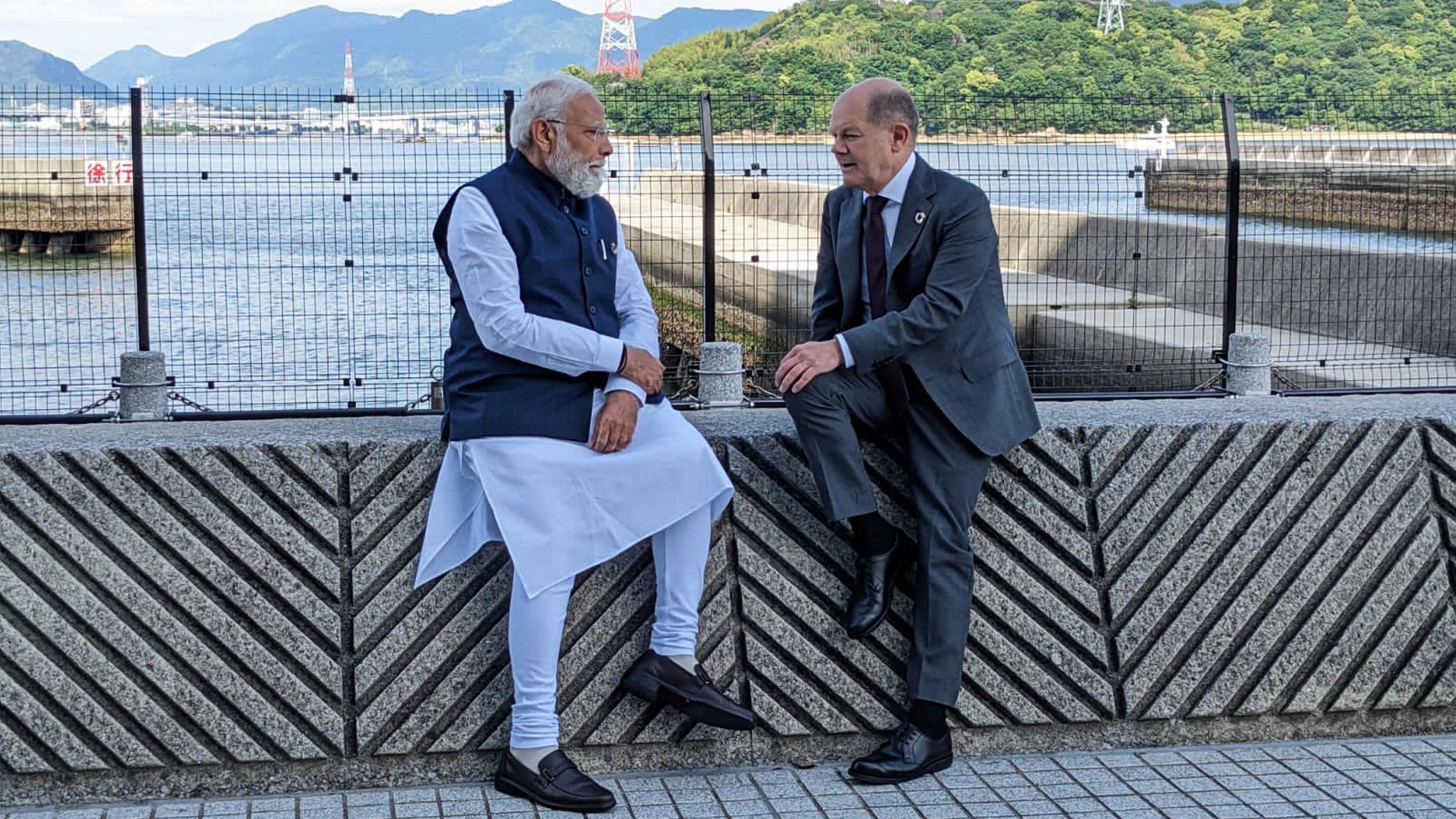 <div class="paragraphs"><p>This file photo shows Prime Minister Narendra Modi with German Chancellor Olaf Scholz  during a meeting, at the G-7 Summit in Hiroshima, Japan, Saturday, May 20, 2023.   </p></div>