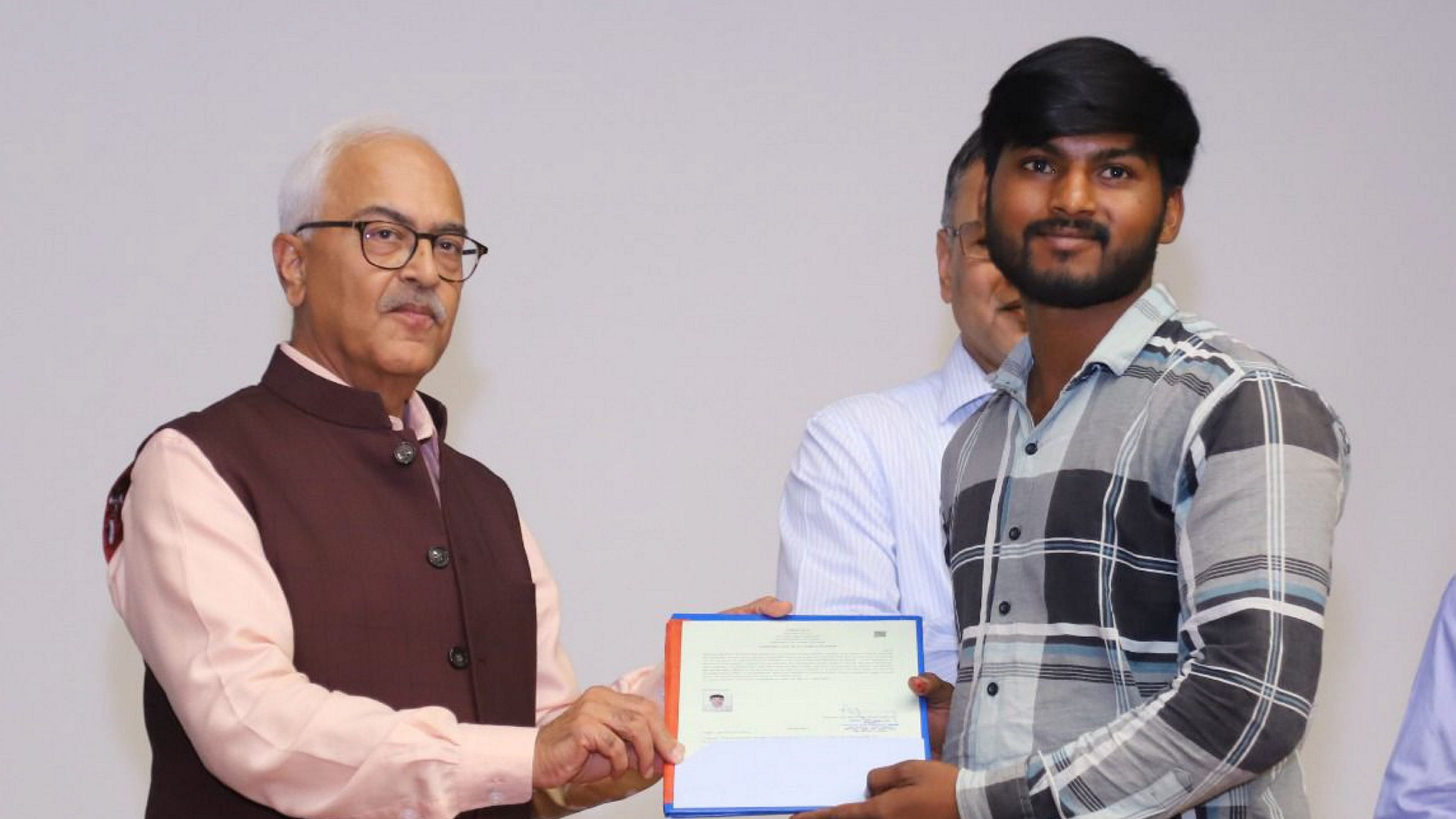 <div class="paragraphs"><p> New Delhi: Union Home Secretary Ajay Kumar Bhalla hands over the first set of citizenship certificates under the Citizenship (Amendment) Act (CAA), in New Delhi, Wednesday, May 15, 2024. </p></div>