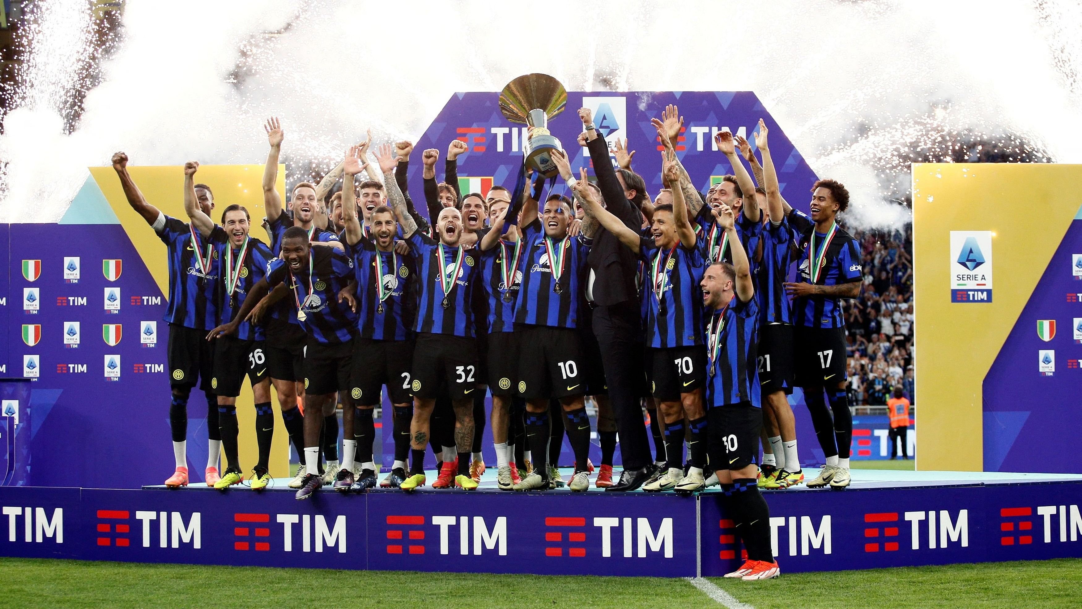 <div class="paragraphs"><p>File Photo: Soccer: May 19, 2024. Inter Milan's Lautaro Martinez and teammates celebrate with the trophy after winning the Serie A </p></div>