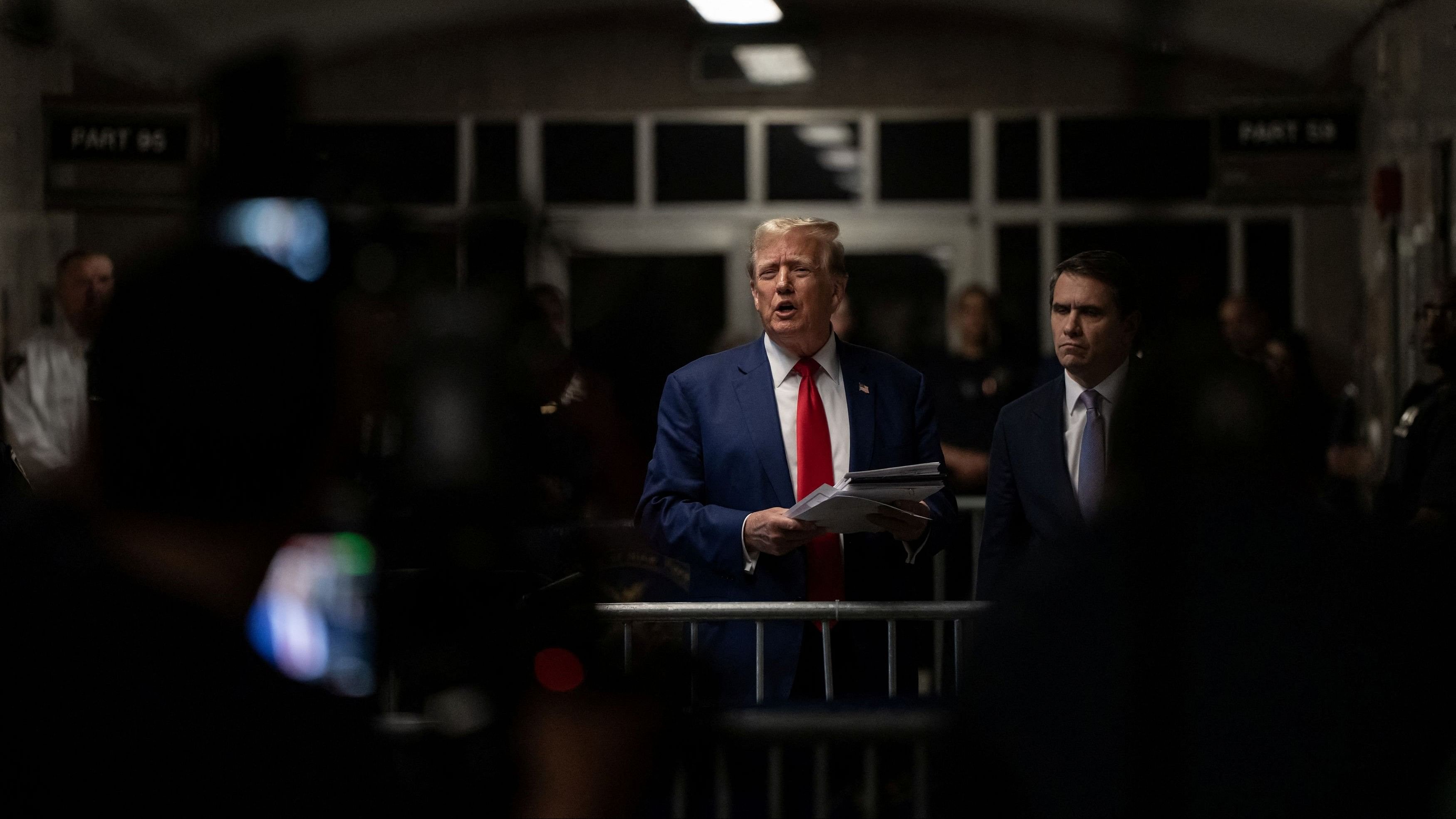 <div class="paragraphs"><p>Former US President Donald Trump, outside the courtroom at the end of the days proceedings in his criminal trial at Manhattan Criminal Court in New York, New York, on May 10, 2024. </p></div>