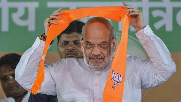 <div class="paragraphs"><p>Union Home Minister Amit Shah addresses during a public meeting for Lok Sabha elections, in Ujiarpur, Bihar, Monday, May 6, 2024.</p></div>