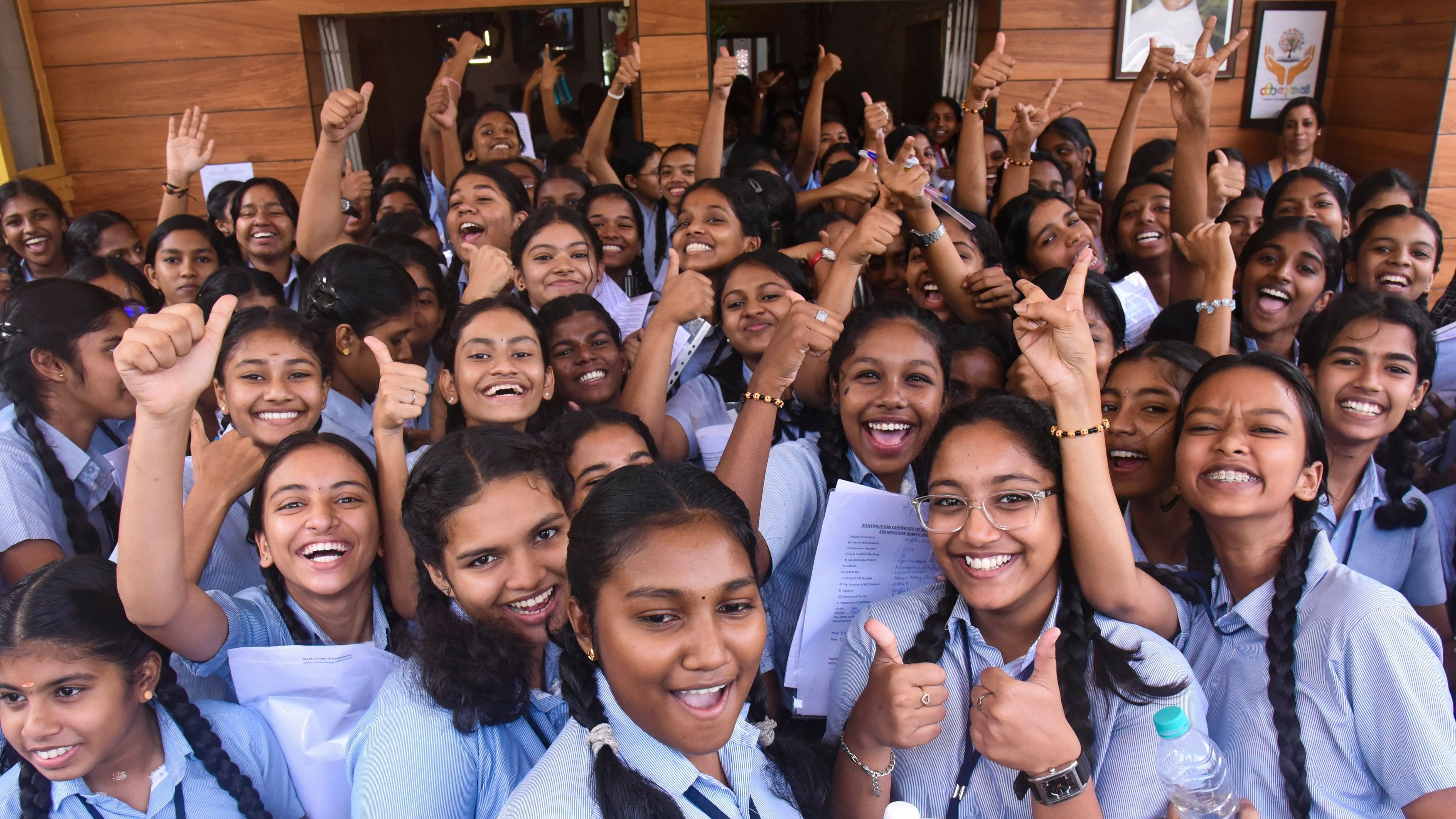 <div class="paragraphs"><p> Students after appearing for the Kerala Board SSLC Class 10th exam at an exam centre.</p></div>