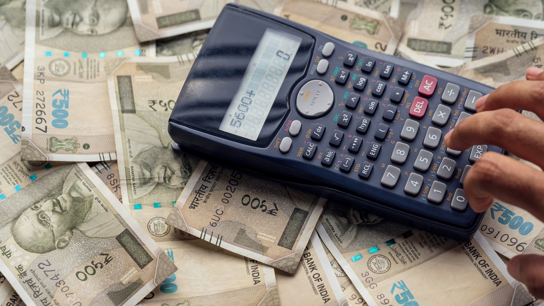 <div class="paragraphs"><p>Representative image showing a calculator and Rs 500 notes.&nbsp;</p></div>