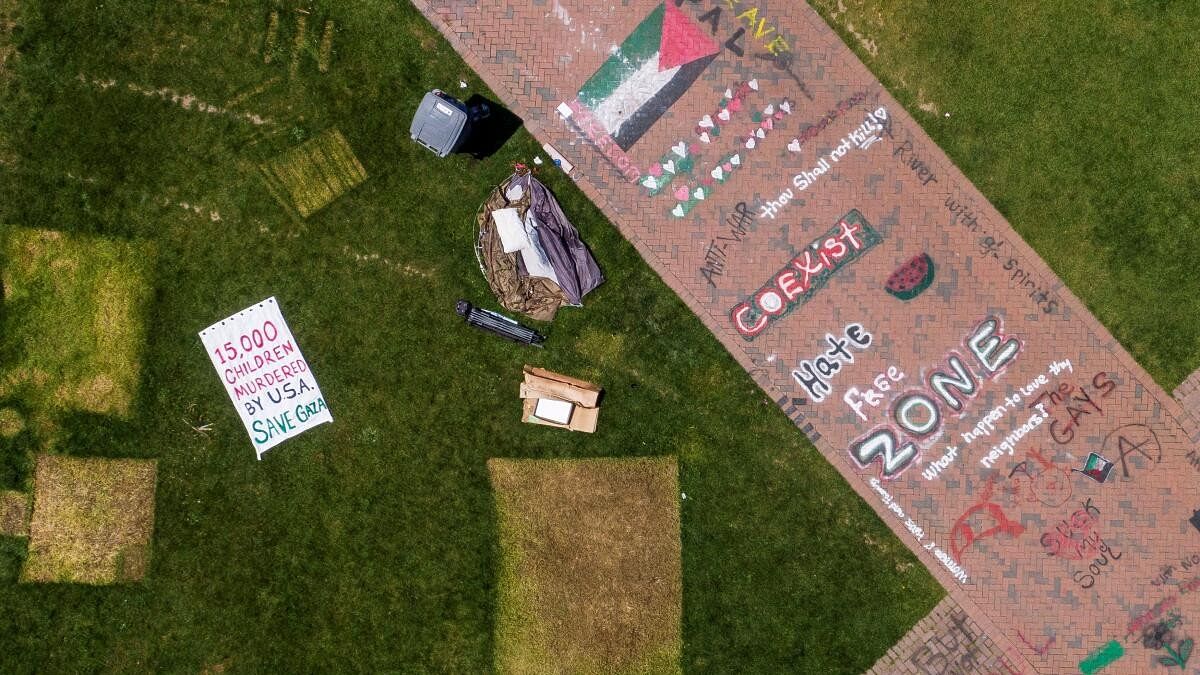 <div class="paragraphs"><p>A drone view shows marks left by tents next to signs as people pack up to leave a protest encampment, organized in support of Palestinians in Gaza, during the ongoing conflict between Israel and the Palestinian Islamist group Hamas, after protesters agreed to voluntarily end the camp by Monday afternoon at the University of Washington in Seattle, Washington, US May 20, 2024.</p></div>