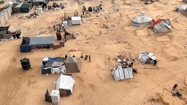 <div class="paragraphs"><p>Displaced Palestinians prepare to evacuate a tent camp, after Israeli forces launched a ground and air operation in the eastern part of Rafah, amid the ongoing conflict between Israel and the Palestinian Islamist group Hamas, in Rafah, in the southern Gaza Strip, May 11, 2024.</p></div>