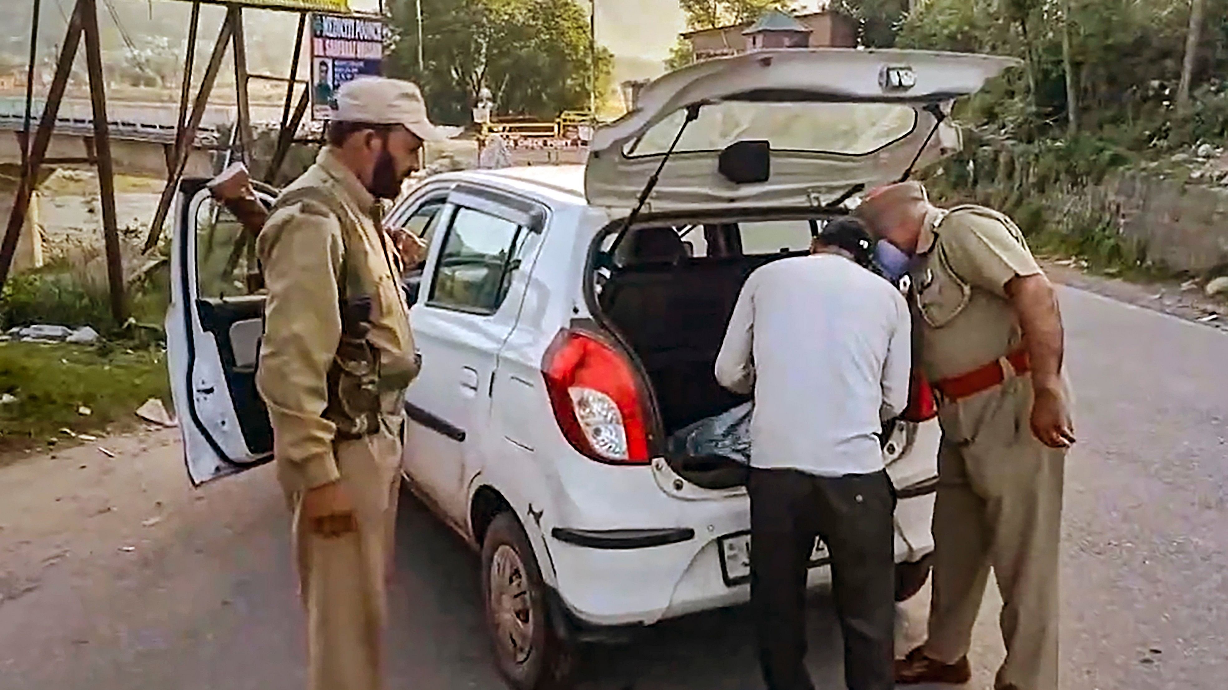 <div class="paragraphs"><p>Security personnel check a vehicle during a search operation after one soldier was killed and four were injured as terrorists ambushed an Indian Air Force (IAF) convoy on Saturday, in Pooch district, Sunday, May 5, 2024. </p></div>