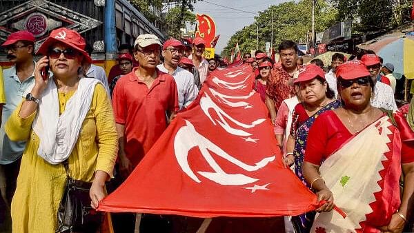 <div class="paragraphs"><p>CPI(M) supporters during a road show of party candidate Sujan Chakraborty for Lok Sabha elections, in Kolkata, Sunday, April 28, 2024.</p></div>