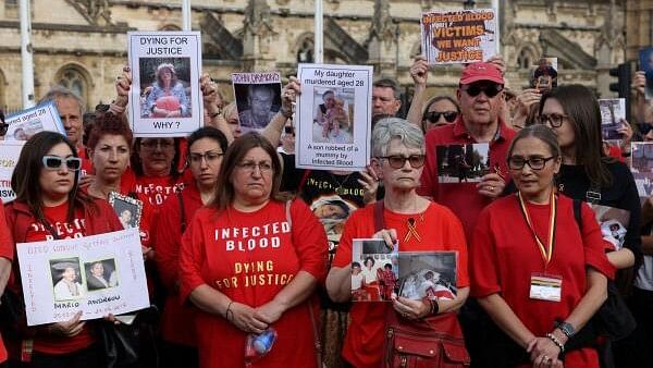 <div class="paragraphs"><p>People impacted by the contaminated blood scandal gather in Westminster ahead of the release of the final report of the Infected Blood Inquiry.</p></div>