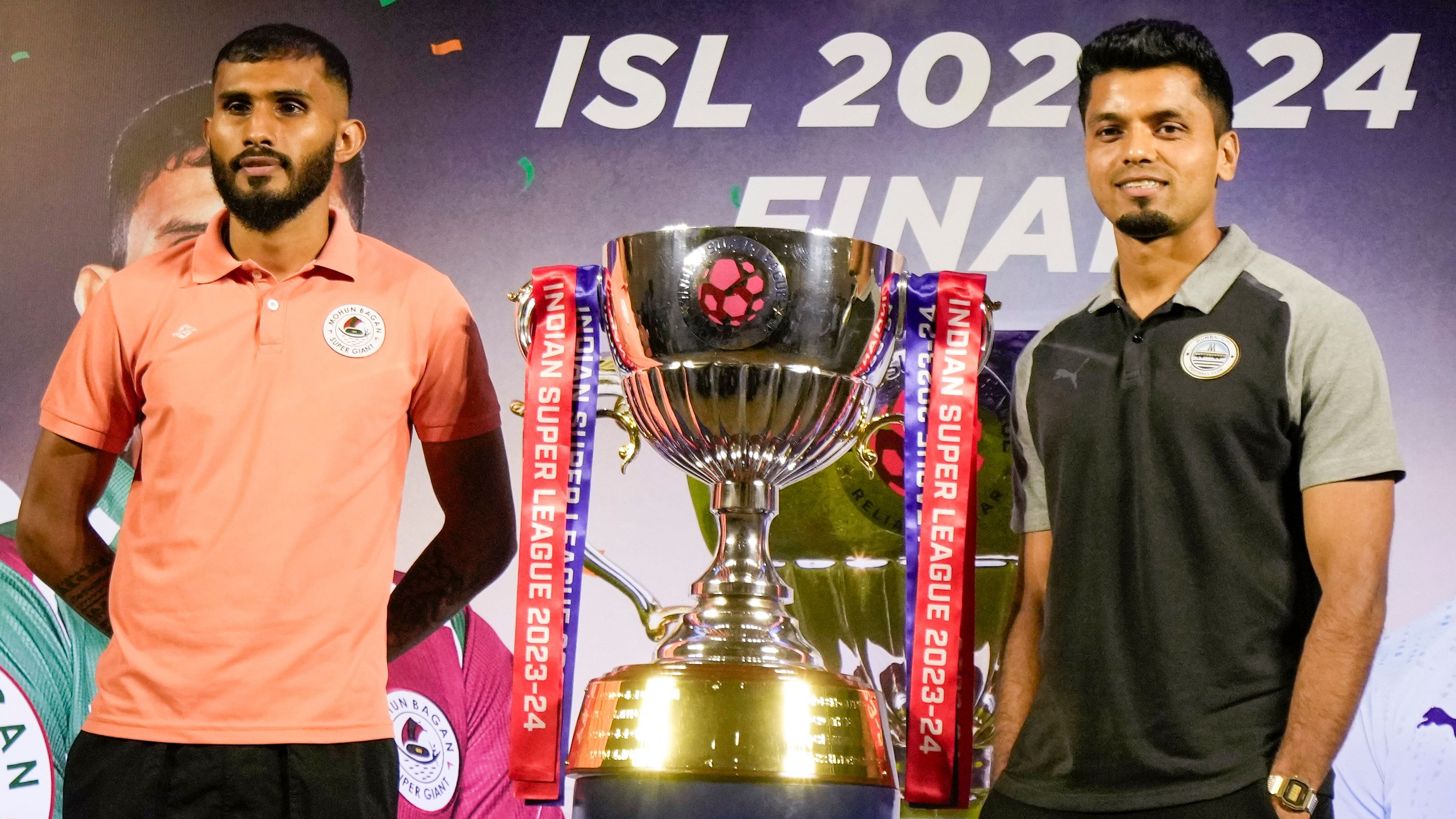 <div class="paragraphs"><p>Mohun Bagan Super Giant captain Subhasish Bose (L) and Mumbai City FC captain Rahul Bheke (R) pose with the Indian Super League (ISL) Trophy on the eve of the ISL Final, in Kolkata.</p></div>