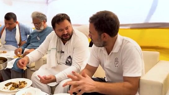 <div class="paragraphs"><p>Rahul Gandhi, Tejashwi Yadav having lunch together.</p></div>