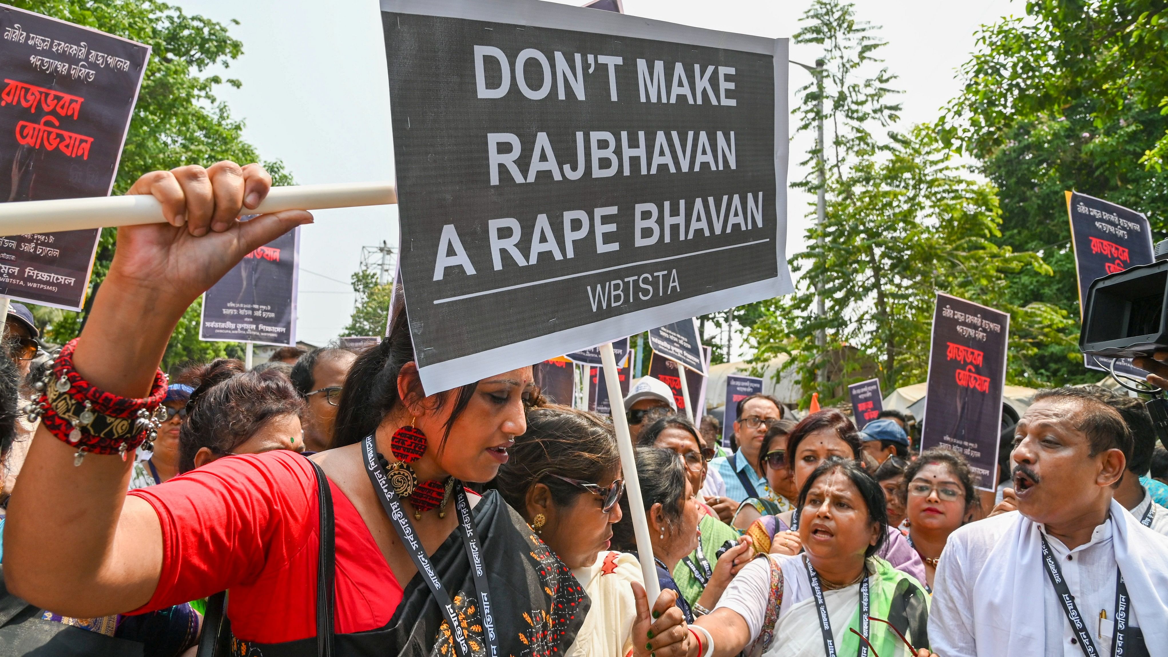 <div class="paragraphs"><p>Trinamool Congress Education Wing members shout slogans during a protest against West Bengal Governor C V Ananda Bose over sexual assault allegations, in Kolkata, on Friday.</p></div>