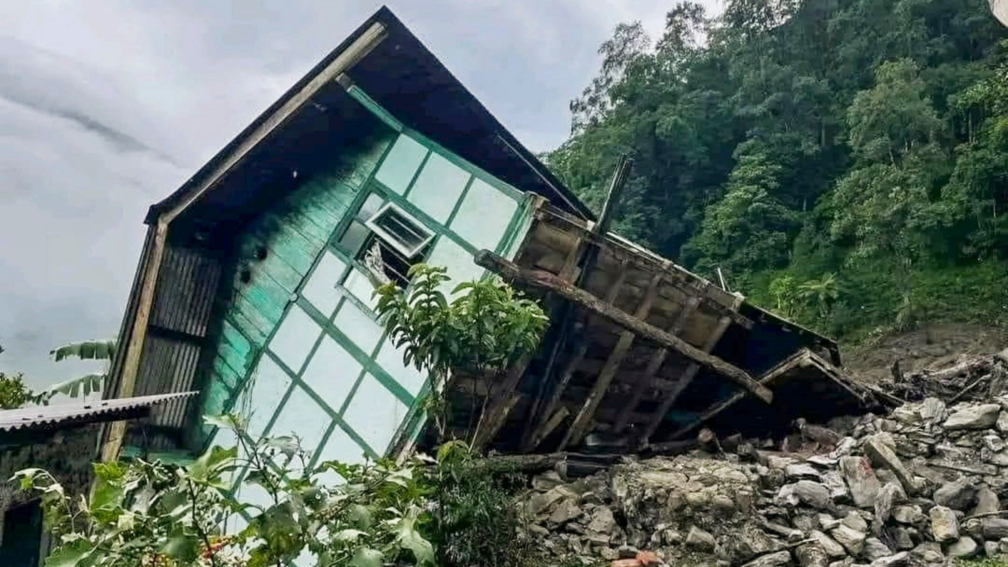 <div class="paragraphs"><p>A house damaged due to landslides triggered by incessant rainfall, in North Sikkim, Thursday, June 13, 2024. </p></div>