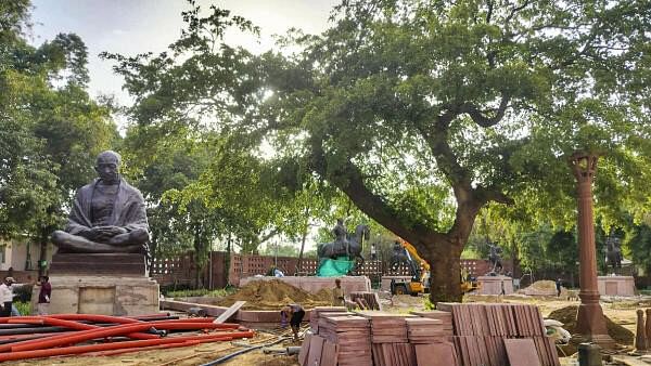 <div class="paragraphs"><p>Statues of Mahatma Gandhi and others during relocation within the Parliament premises as part of the redevelopment project.</p></div>