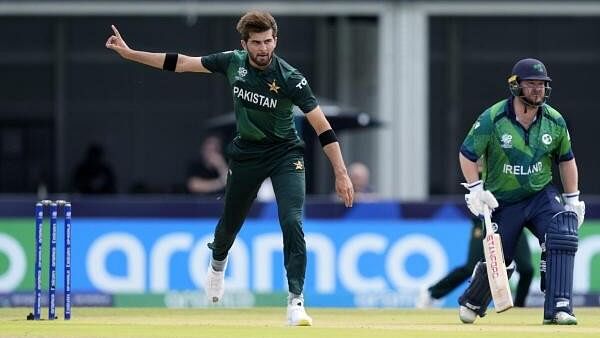 <div class="paragraphs"><p>Pakistan's Shaheen Shah Afridi celebrates the wicket of Ireland's Andrew Balbirnie during the ICC Men's T20 World Cup cricket match between Ireland and Pakistan at the Central Broward Regional Park Stadium, Lauderhill, Fla., Sunday, June 16, 2024.</p></div>