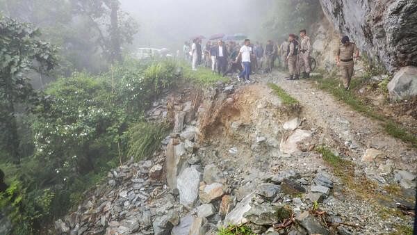 <div class="paragraphs"><p>A section of a road damaged due to a landslide triggered by heavy rainfall, in Sikkim.</p></div>