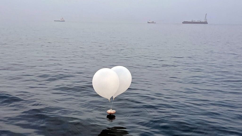 <div class="paragraphs"><p>A balloon carrying various objects including what appeared to be trash, believed to have been sent by North Korea, is pictured at the sea off Incheon, South Korea.</p></div>