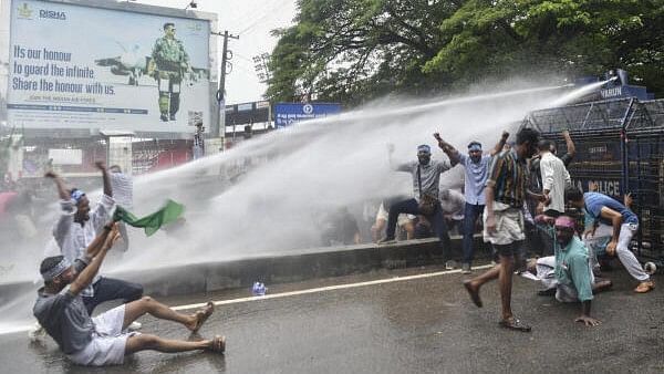 <div class="paragraphs"><p>Police personnel use water cannons to disperse Muslim Youth League (MYL) activists during their protest march over the shortage of Plus-I seats in the Malabar region, in Thiruvananthapuram, Tuesday, June 25, 2024. </p></div>