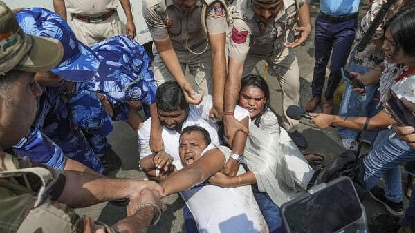<div class="paragraphs"><p>Indian Youth Congress (IYC) President Srinivas BV and others being detained during their protest at Jantar Mantar over the alleged rigging of the NEET UG exam and against the Agniveer Scheme, in New Delhi</p></div>
