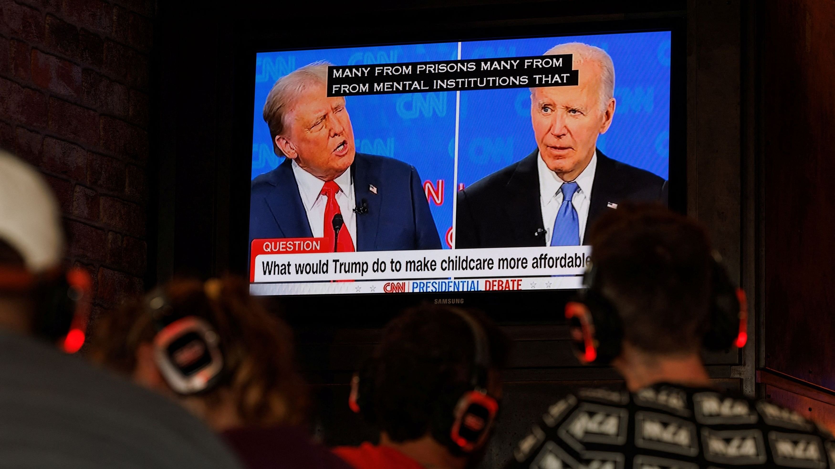 <div class="paragraphs"><p>People watch the first Presidential debate between US President Joe Biden and Republican candidate, former President Donald Trump.</p></div>