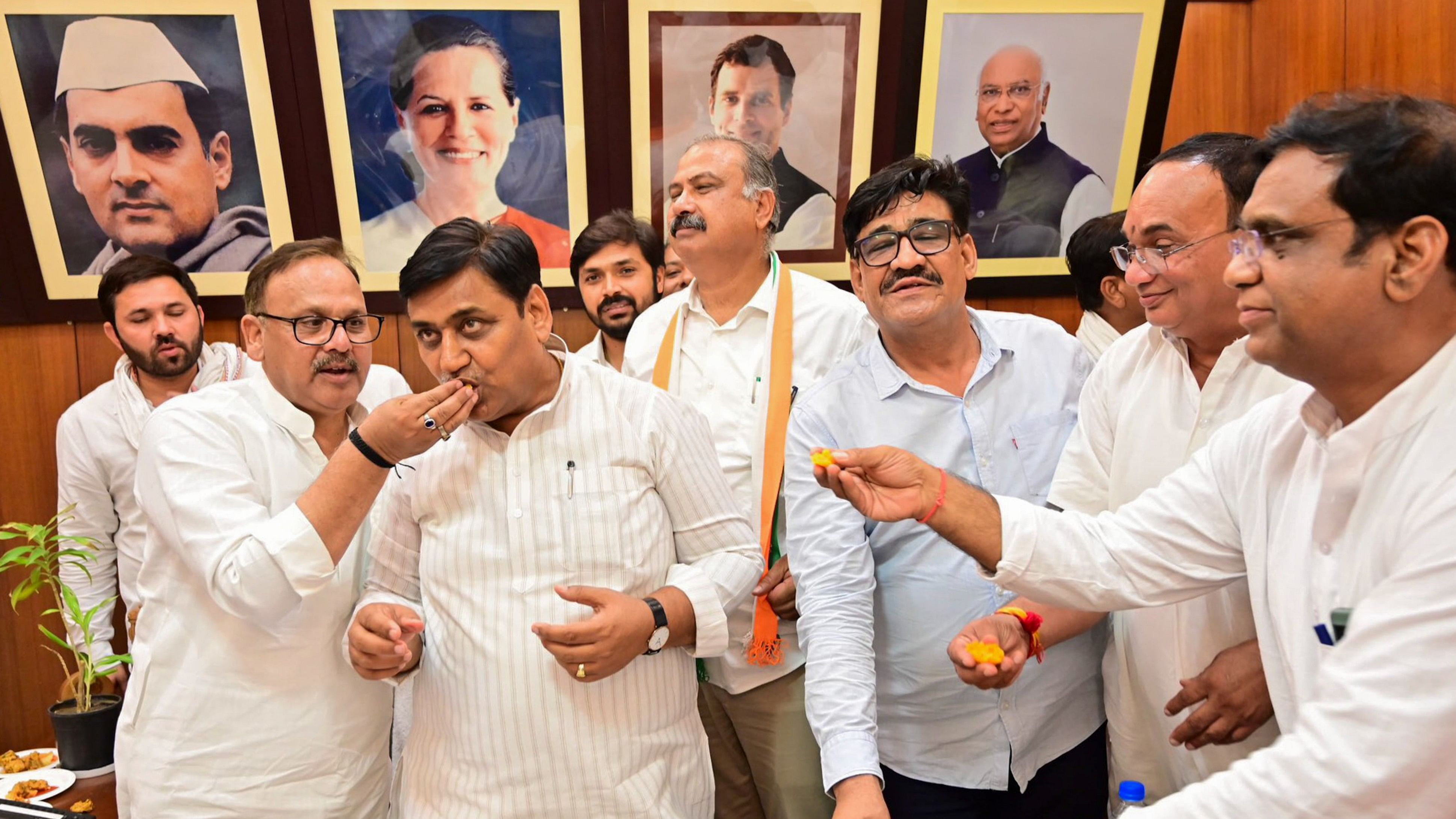 <div class="paragraphs"><p>Rajasthan Congress chief Govind Singh Dotasra with party leader celebrates their gain in Lok Sabha polls during counting of votes, in Jaipur</p></div>