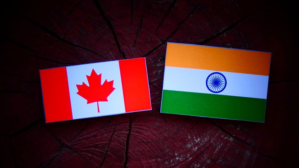 <div class="paragraphs"><p>Canadian and Indian flags.</p></div>