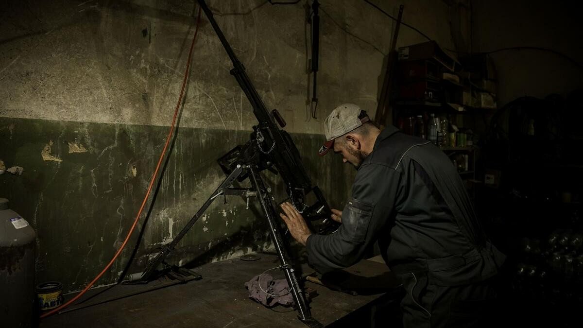 <div class="paragraphs"><p>A Ukrainian serviceman of a repair and restoration battalion of the 24th Separate Mechanized Brigade of the Ukrainian Armed Forces named after King Danylo, repairs a machine gun at a workshop, amid Russia's attack on Ukraine, in an undisclosed location, Ukraine June 18, 2024.</p></div>