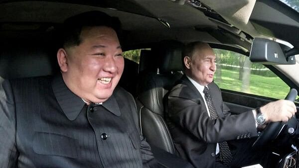 <div class="paragraphs"><p>Russia's President Vladimir Putin and North Korea's leader Kim Jong Un ride an Aurus car in Pyongyang, North Korea</p></div>