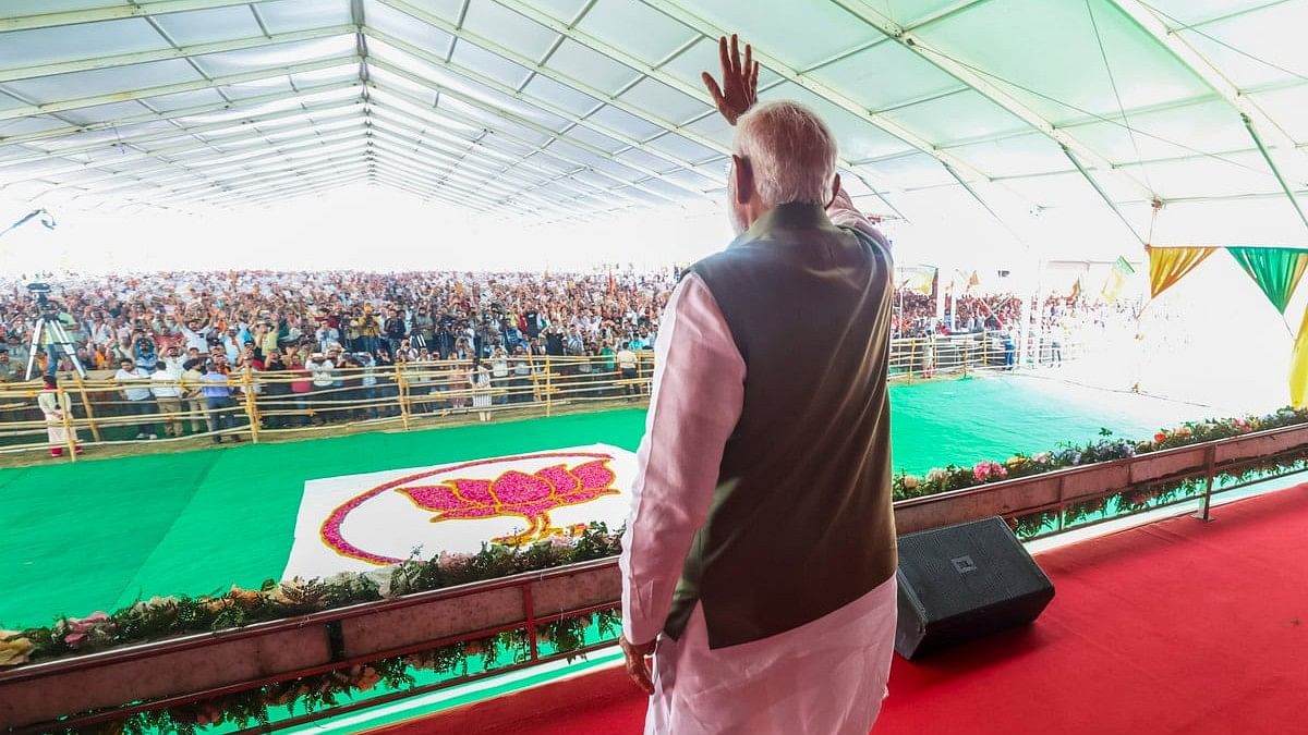 <div class="paragraphs"><p> Narendra Modi during a public meeting for Lok Sabha elections</p></div>