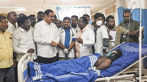 <div class="paragraphs"><p>Former union minister Anbumani Ramadoss speaks with medics at a government hospital where people who consumed spurious liquor are being treated, in Kallakurichi district, Friday, June 21, 2024. </p></div>