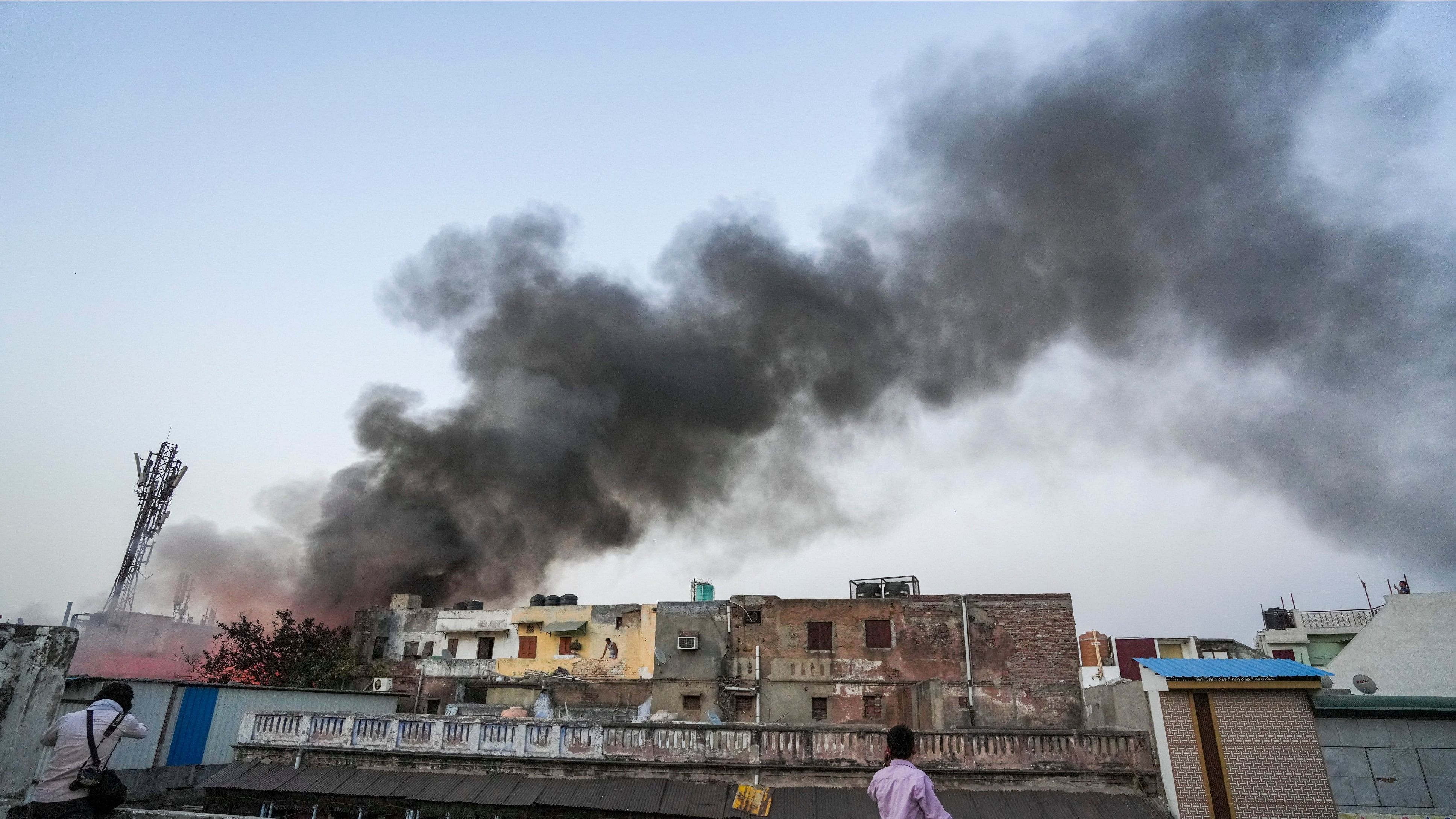 <div class="paragraphs"><p>Smoke billows out after a massive fire broke out at Marwadi Katra in Chandni Chowk.</p></div>