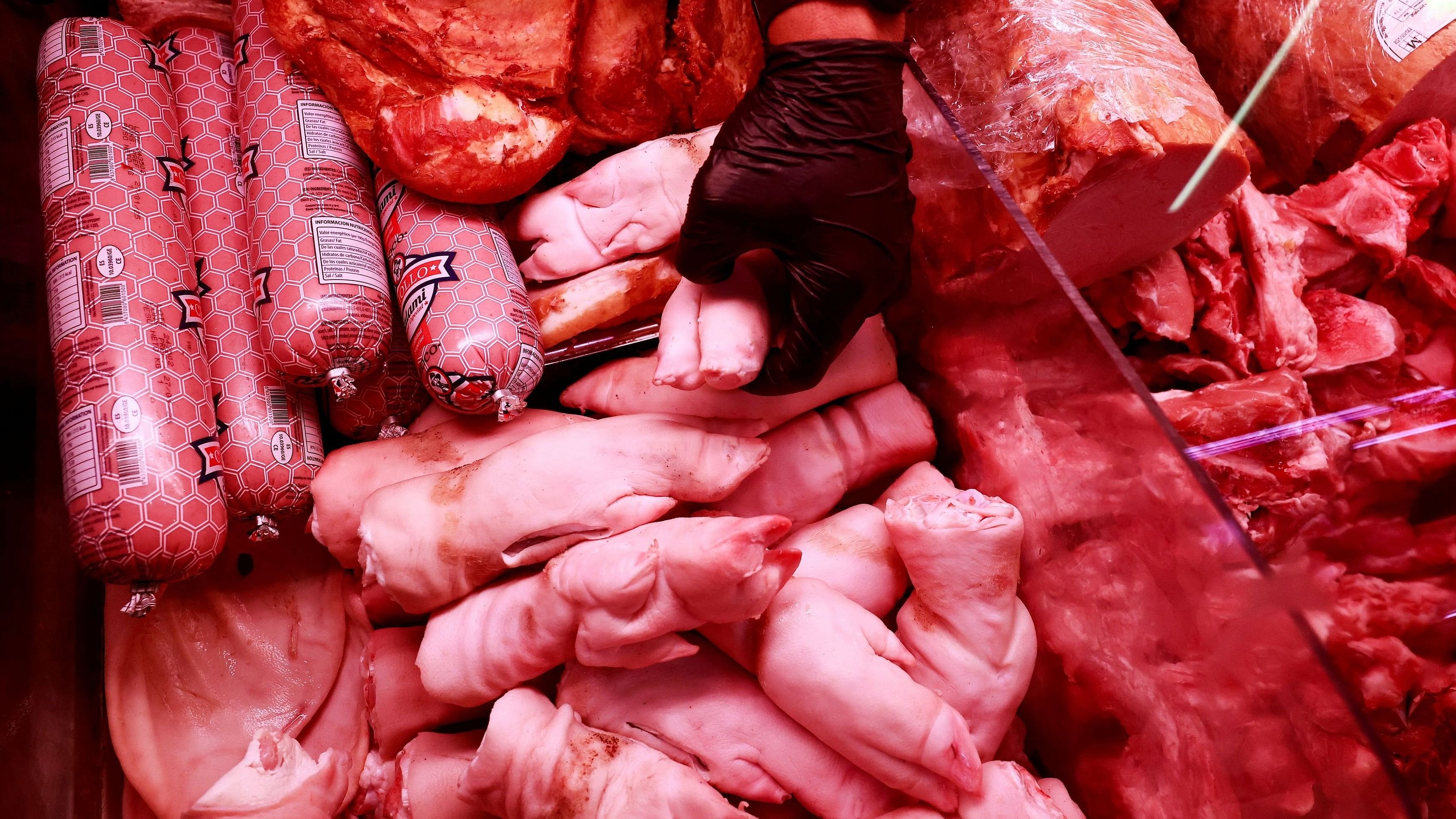 <div class="paragraphs"><p>Pieces of porks are seen at a market stall.</p></div>