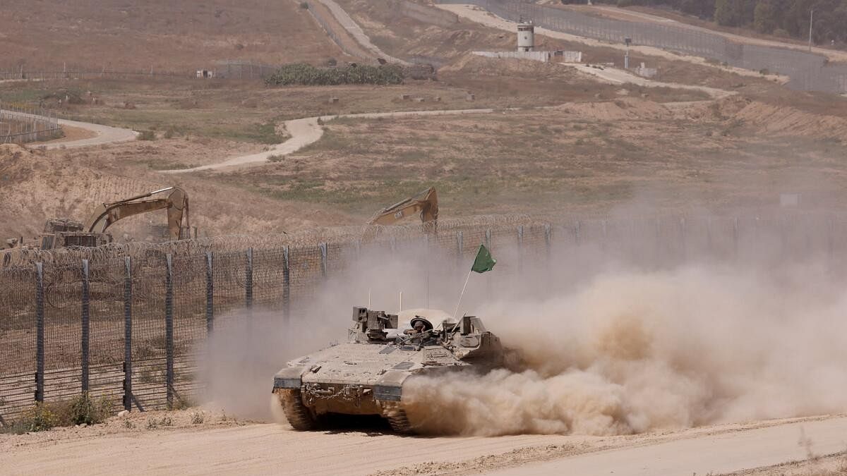 <div class="paragraphs"><p>Israeli tank manoeuvres near the Israel-Gaza border, amid the ongoing conflict between Israel and Hamas, in Israel, June 8, 2024</p></div>