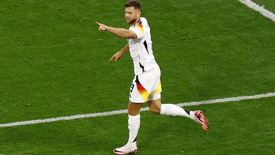 <div class="paragraphs"><p>Germany's Niclas Fullkrug celebrates scoring a goal.</p></div>