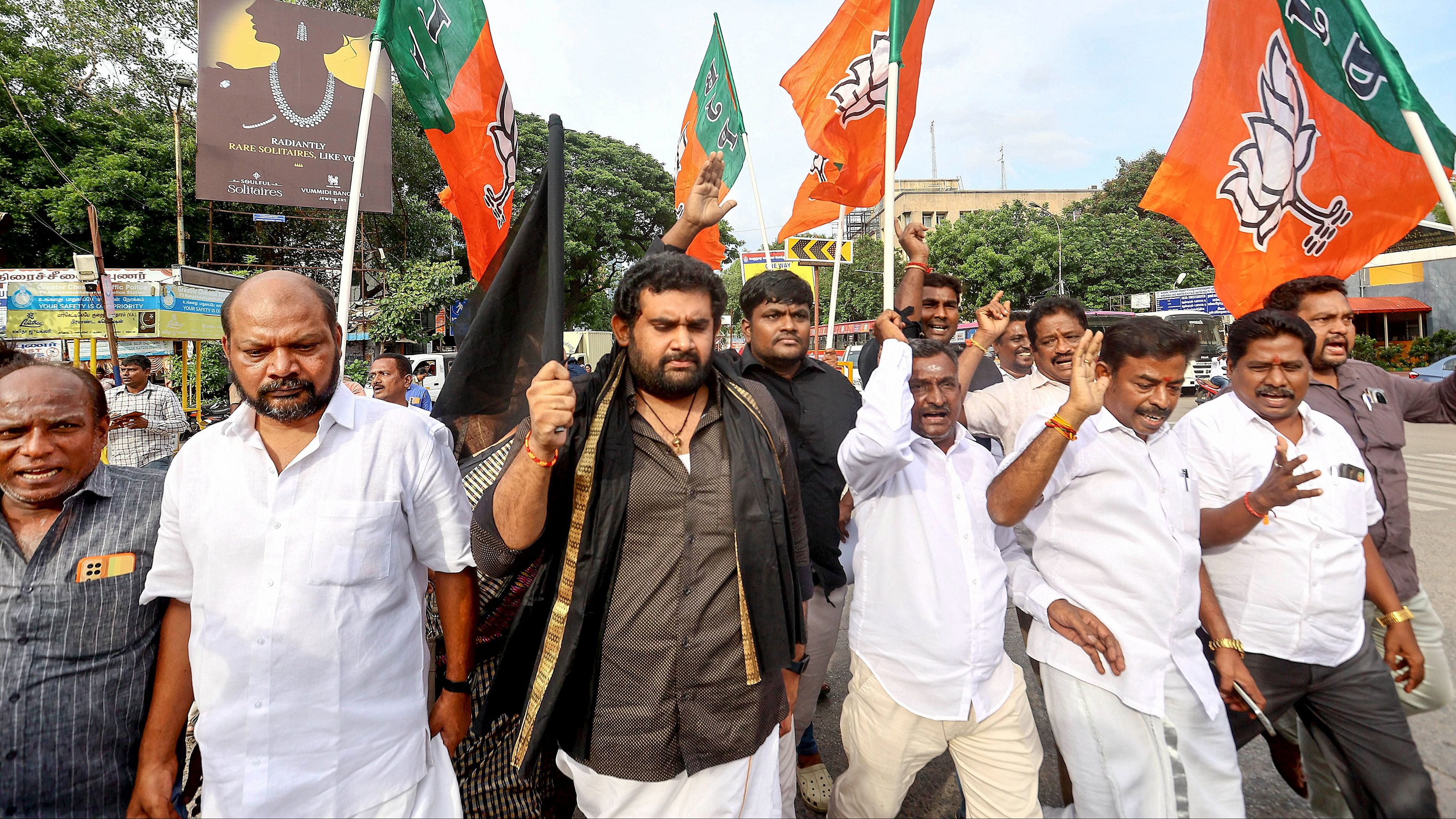 <div class="paragraphs"><p>BJP workers take part in a protest against the Tamil Nadu government over Kallakurichi hooch tragedy, in Chennai, Saturday, June 22, 2024.</p></div>