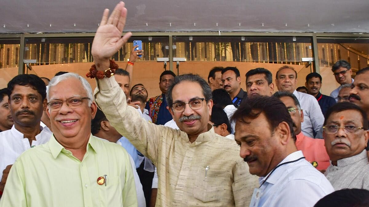 <div class="paragraphs"><p>Shiv Sena (UBT) chief Uddhav Thackeray waves upon his arrival at the Vidhan Bhavan on the first day of the Monsoon session of the state Assembly, in Mumbai on Thursday.&nbsp;</p></div>
