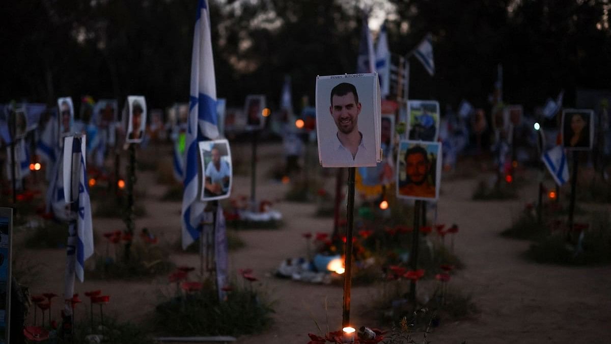 <div class="paragraphs"><p>Photos of hostages are seen at the site of the Nova festival, where people were killed and kidnapped during the October 7 attack by Hamas gunmen from Gaza in Israel.&nbsp;</p></div>